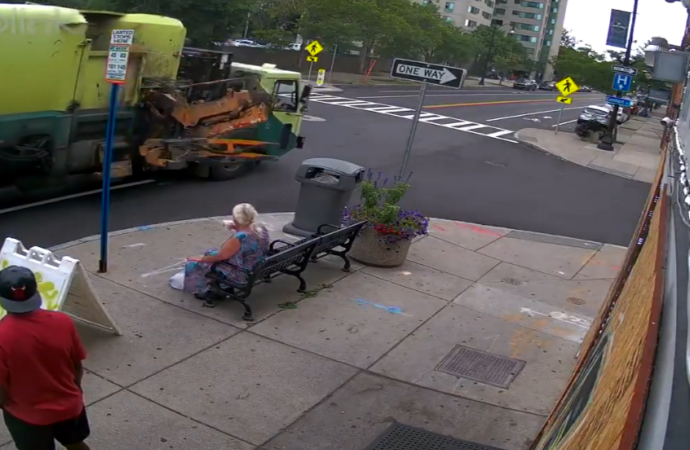 Woman Thrown to the Ground While Sitting on a Bench at the Bus Stop