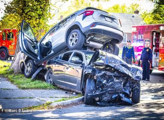 Car Accident on Detroit’s East Side: Charger Runs Stop Sign, Collides with SUV